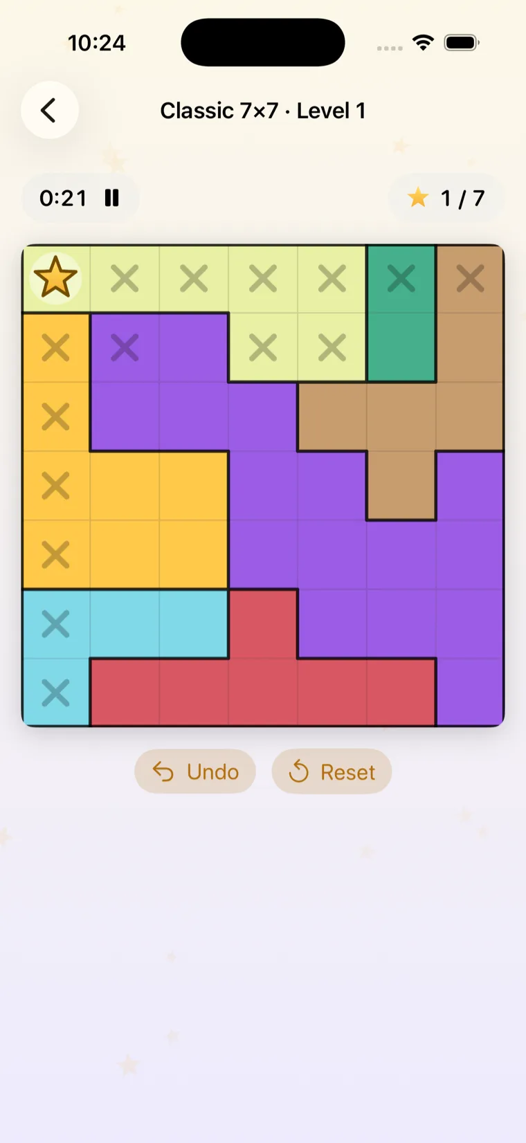 A Star Battle puzzle mid-solve, with a star placed and cells crossed out